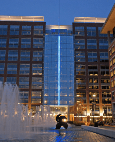 Decorative fountain at entrance of upscale apartment building