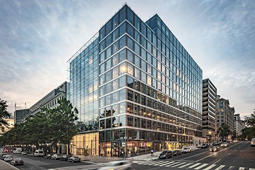 Modern glass building on city street